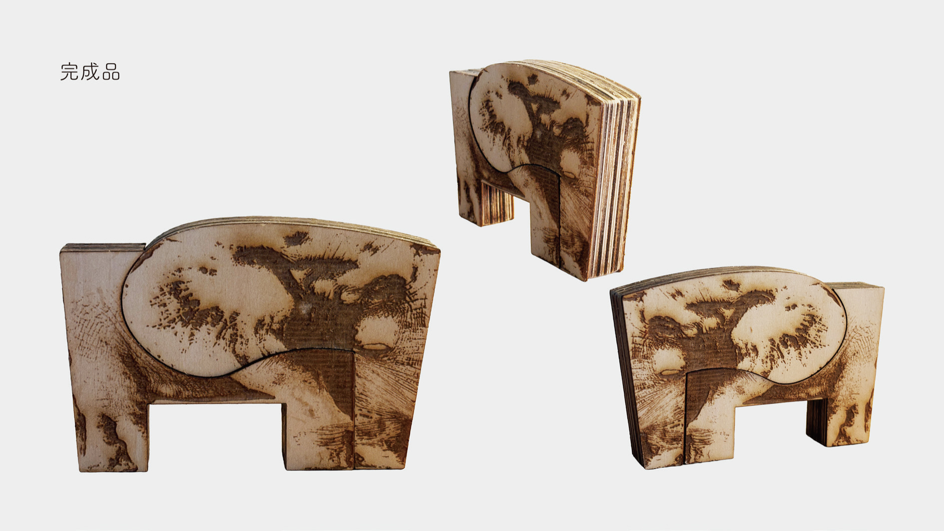 ▲シンプルなデザインにリアルなゾウの彫刻をほどこした積み木